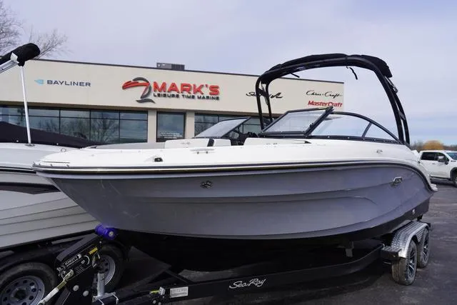Slide: The Image of 2024 Sea Ray SPX 210 boat on trailer at dealership, front view. - 5