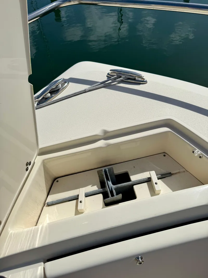 Slide: The Image of 2016 Scout 245 Dorado boat toilet with marine equipment in compact space. - 10