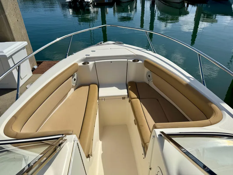 Slide: The Image of Control panel of a 2016 Scout 245 Dorado boat with navigation equipment. - 5