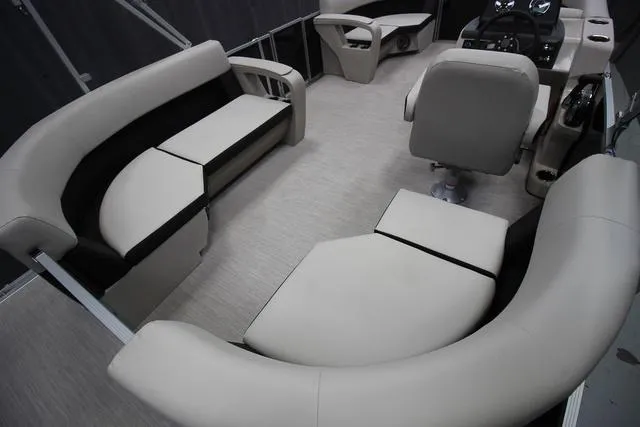 Slide: The Image of 2024 Harris Breeze 210 CW pontoon boat interior with spacious seating and modern design. - 4