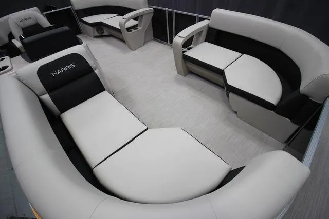 Slide: The Image of 2024 Harris Breeze 210 CW pontoon boat interior with stylish seating and modern design. - 6