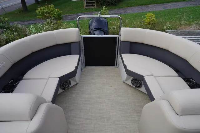 Slide: The Image of 2024 Harris Cruiser 230 CWDH pontoon boat with spacious seating and modern design. - 27