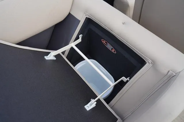 Slide: The Image of 2024 Harris Cruiser 230 CWDH storage compartment with integrated cooler. - 34