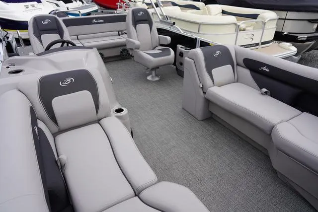 Slide: The Image of 2025 Barletta Boats A22UC interior with gray seating and modern design. - 13