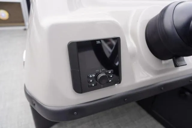Slide: The Image of Control panel of 2025 Barletta Boats A22UC with JBL audio system. - 27