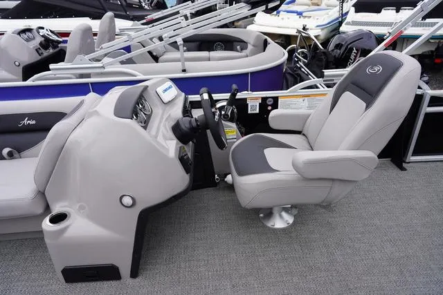 Slide: The Image of Captain's seat and helm of 2025 Barletta Boats A22UC pontoon. - 31