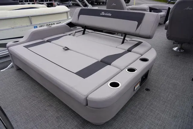 Slide: The Image of 2025 Barletta Boats A22UC with gray seating and cup holders on deck. - 41