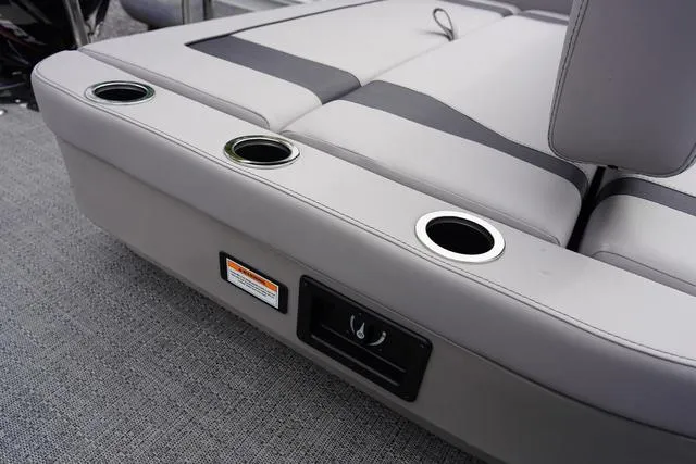 Slide: The Image of 2025 Barletta Boats A22UC seating with cup holders and modern design. - 5