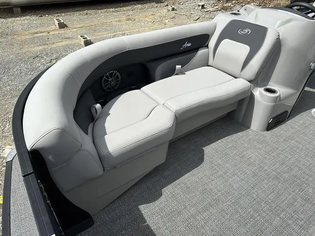 Slide: The Image of 2025 Barletta Boats A22UC pontoon seating with gray upholstery and integrated speaker. - 13