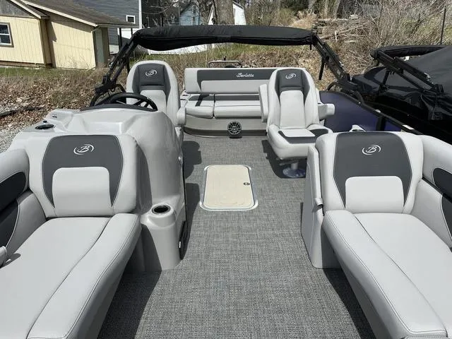 Slide: The Image of 2025 Barletta Boats A22UC interior with gray seating and modern design. - 14