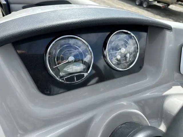 Slide: The Image of Dashboard of 2025 Barletta Boats A22UC with dual gauges. - 18