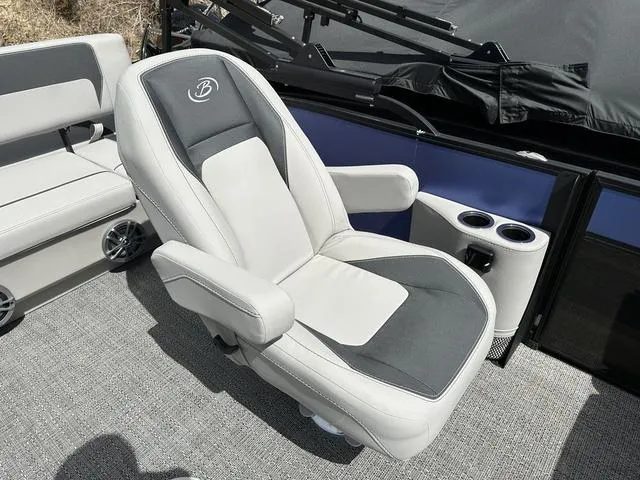 Slide: The Image of 2025 Barletta A22UC boat seat with cup holders and sleek design. - 24