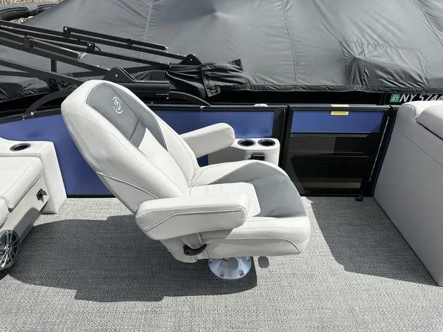 Slide: The Image of Captain's chair on 2025 Barletta A22UC boat, featuring sleek design and comfortable seating. - 29