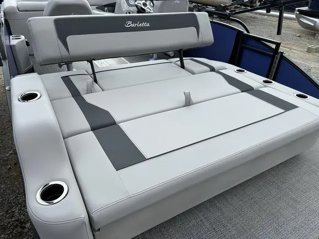 Slide: The Image of 2025 Barletta A22UC boat with gray seating and cup holders. - 34