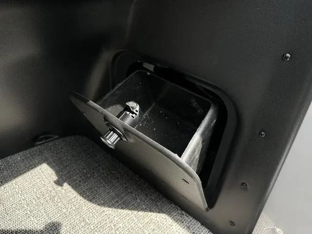 Slide: The Image of Open storage compartment in 2025 Barletta Boats A22QC interior. - 23