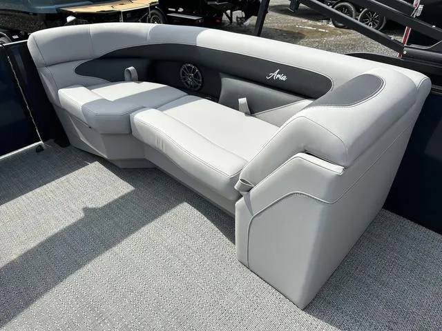 Slide: The Image of Luxurious seating on 2025 Barletta Boats A22QC, featuring sleek gray upholstery. - 32