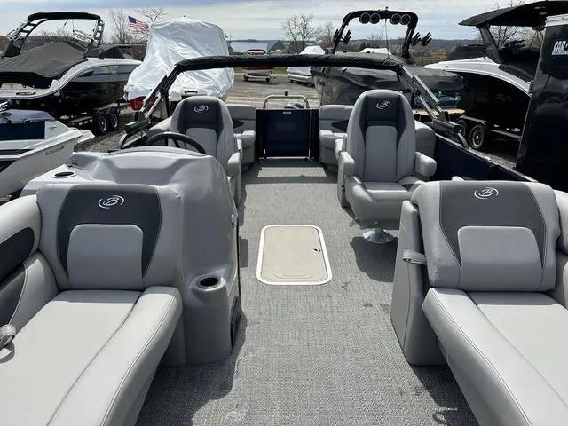 Slide: The Image of 2025 Barletta Boats A22QC pontoon interior with gray seating and open deck layout. - 8