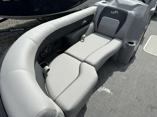Slide: The Image of Luxurious seating on 2025 Barletta Boats A22QC, featuring sleek gray upholstery. - 9