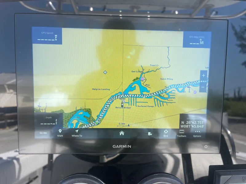 Slide: The Image of Garmin navigation display on 2006 Southport 28 Center Console boat, showing detailed waterway map. - 12