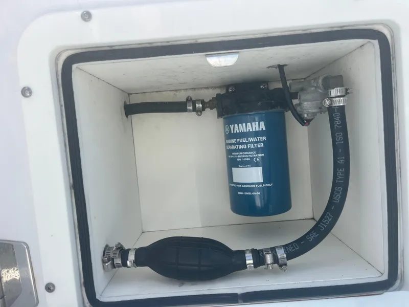 Slide: The Image of Yamaha marine fuel water separator filter in a 2006 Southport 28 Center Console boat. - 18