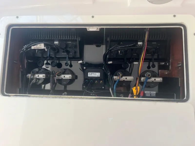 Slide: The Image of Electrical panel of a 2006 Southport 28 Center Console boat, showcasing wiring and components. - 30
