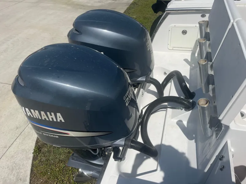 Slide: The Image of Twin Yamaha outboard engines on a 2006 Southport 28 Center Console boat. - 33
