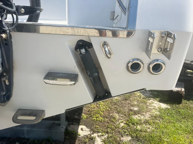 Slide: The Image of Close-up of 2006 Southport 28 Center Console boat's stern with fittings and ladder steps. - 37