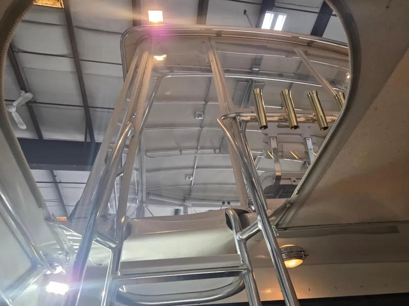 Slide: The Image of 1989 Chris-Craft 42 Sportfish Commander, interior view of ladder and ceiling details. - 28