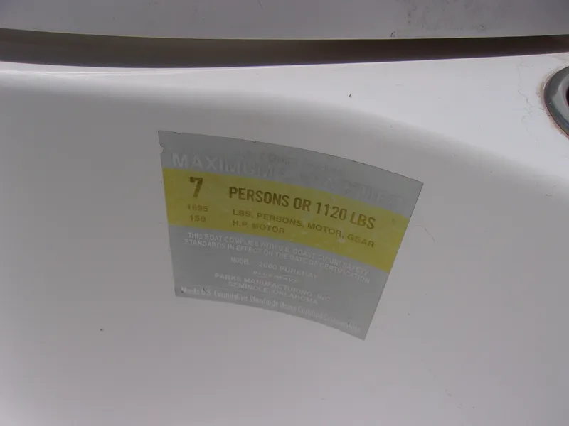 Slide: The Image of Capacity label on 2018 Blue Wave 2000 SL boat, 7 persons or 1120 lbs. - 16
