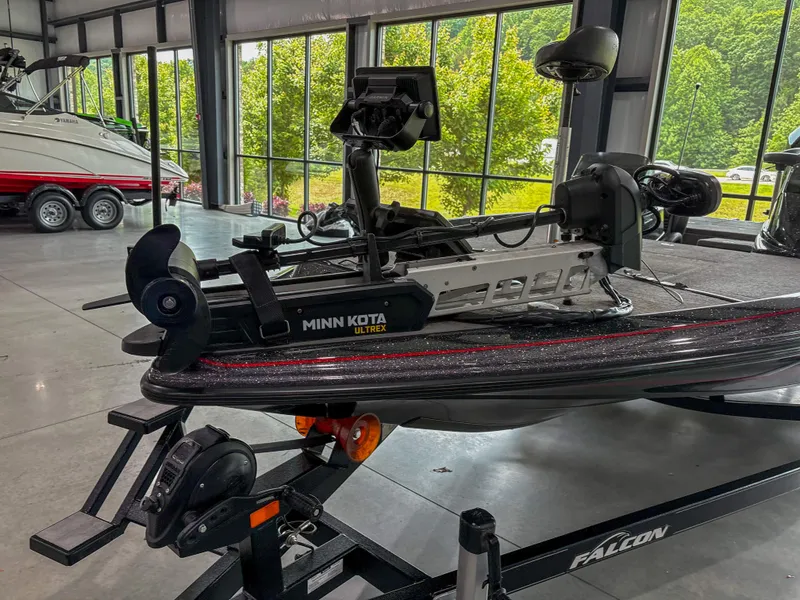 Slide: The Image of 2020 Falcon F21 boat with Minn Kota Ulterra motor in a showroom. - 11