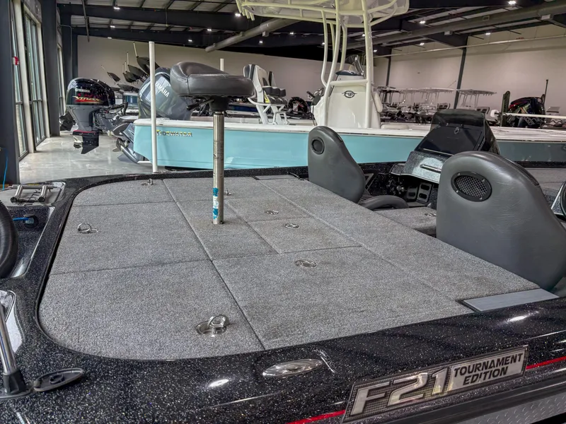 Slide: The Image of Falcon F21 Tournament Edition boat interior, showcasing seating and deck, 2020 model. - 4