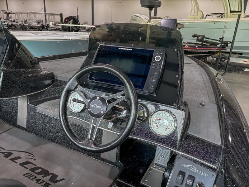 Slide: The Image of Cockpit of 2020 Falcon F21 boat with steering wheel and navigation system. - 5