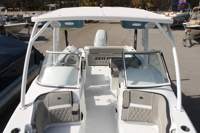 Slide: The Image of 2024 Sea Pro 240 boat with dual consoles and spacious seating. - 21
