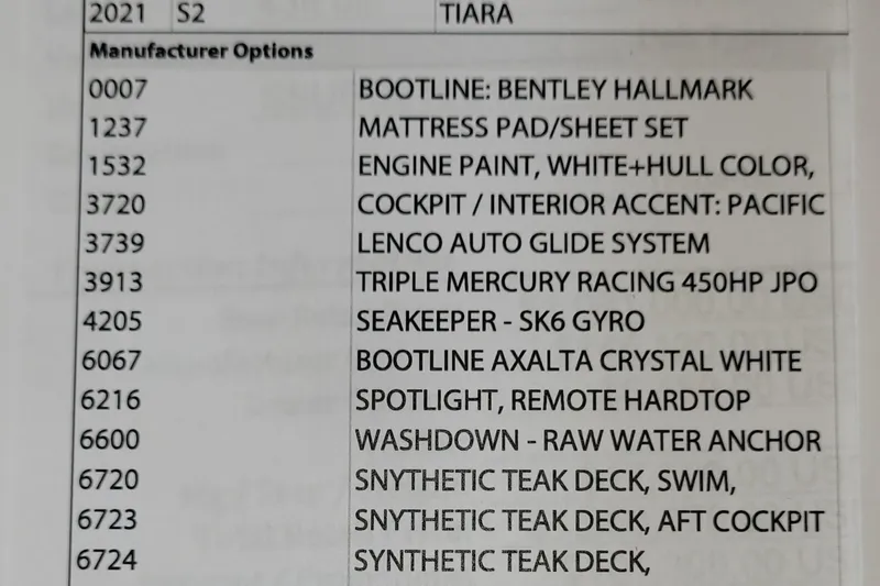 Slide: The Image of 2021 Tiara Sport 43 LE options list with features like Seakeeper SK6 Gyro, synthetic teak deck. - 49