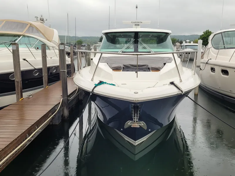 Slide: The Image of 2021 Tiara Sport 43LE yacht docked at marina, front view. - 5