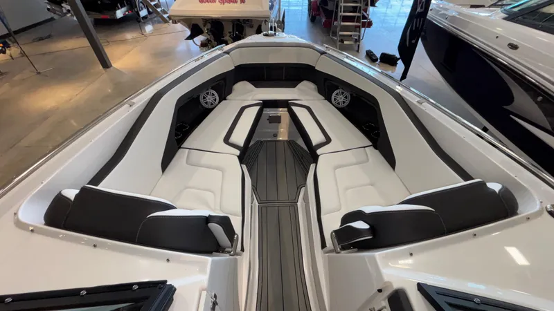 Slide: The Image of 2025 Monterey 298 Super Sport boat interior with sleek seating and modern design. - 14
