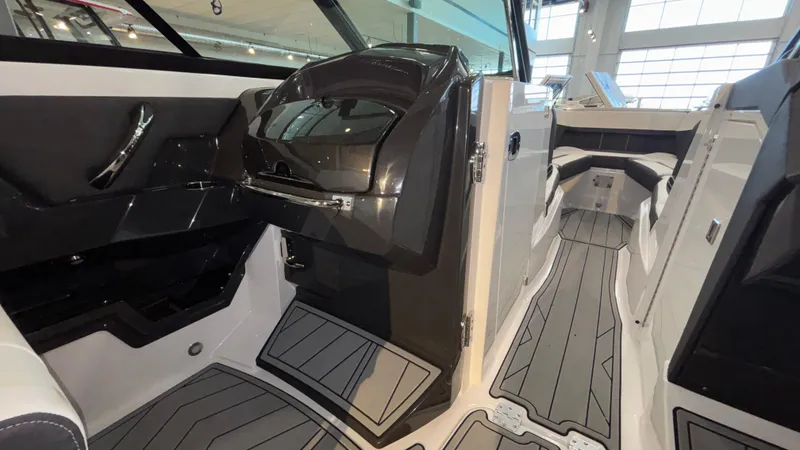 Slide: The Image of 2025 Monterey 298 Super Sport boat interior with sleek design and modern features. - 18