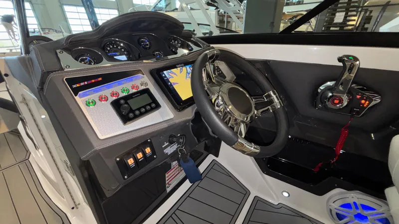 Slide: The Image of 2025 Monterey 298 Super Sport dashboard with modern controls and steering wheel. - 19