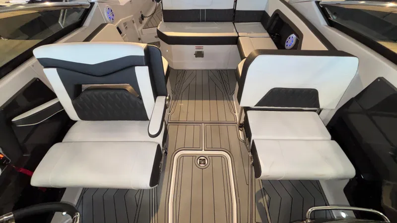 Slide: The Image of Interior of 2025 Monterey 298 Super Sport boat with sleek seating and modern design. - 22