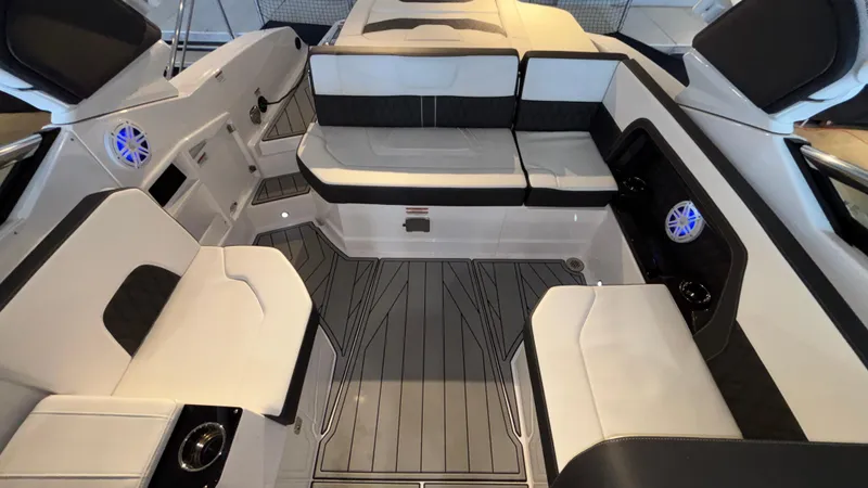 Slide: The Image of 2025 Monterey 298 Super Sport boat interior with sleek seating and modern design. - 23