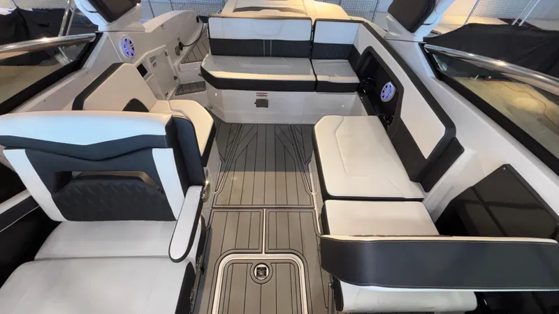 Slide: The Image of 2025 Monterey 298 Super Sport interior with sleek seating and modern design. - 24