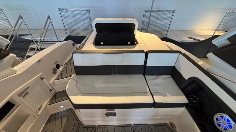 Slide: The Image of 2025 Monterey 298 Super Sport boat interior with sleek seating and modern design. - 27