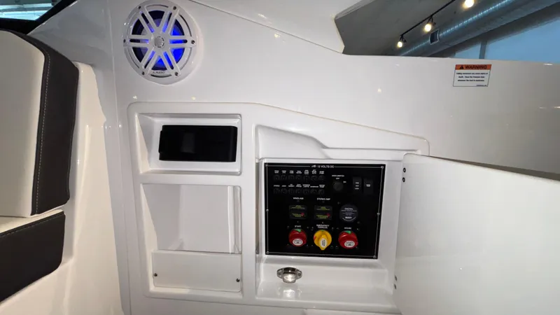 Slide: The Image of 2025 Monterey 298 Super Sport control panel with speaker and storage compartments. - 29