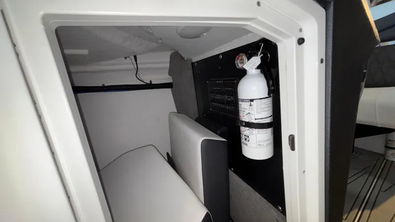 Slide: The Image of Interior cabin of 2025 Monterey 298 Super Sport with fire extinguisher. - 32