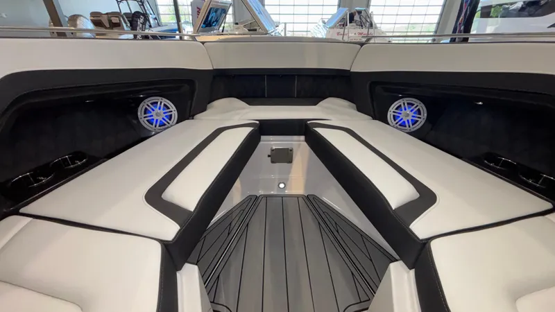 Slide: The Image of 2025 Monterey 298 Super Sport boat interior with sleek seating and modern design. - 33