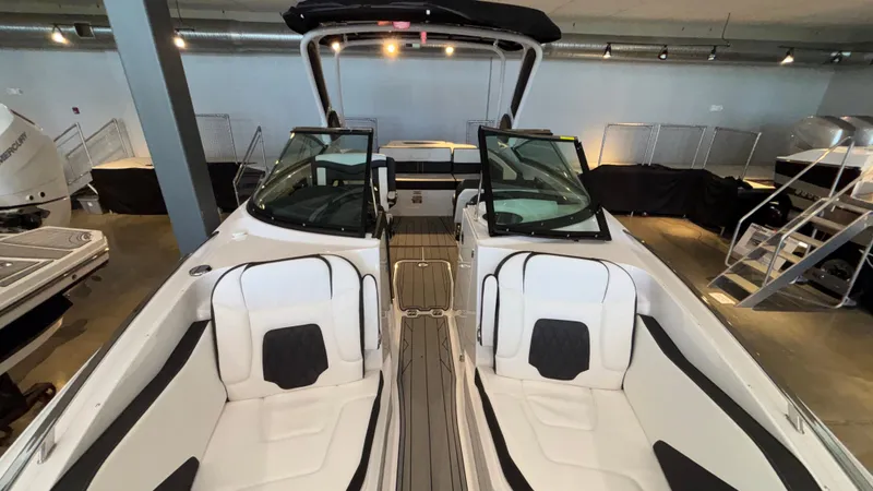Slide: The Image of 2025 Monterey 298 Super Sport boat interior with sleek seating and modern design. - 36