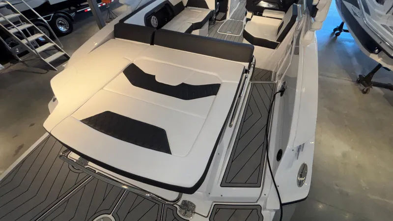 Slide: The Image of 2025 Monterey 298 Super Sport boat interior with sleek seating and modern design. - 5