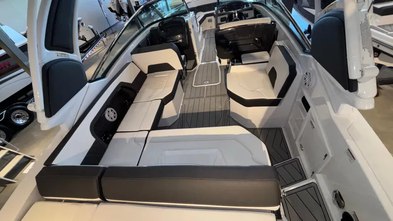 Slide: The Image of 2025 Monterey 298 Super Sport boat interior with sleek seating and modern design. - 6