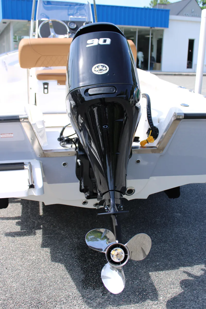Slide: The Image of 2025 Key West 1720 Center Console boat with a 90 HP outboard motor. - 12