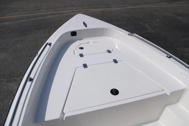 Slide: The Image of 2025 Key West 1720 Center Console boat deck with storage compartments. - 14
